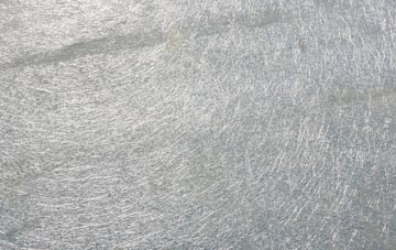 Leek laminate fibreglass or shingles?